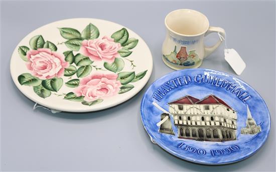 Moorcroft Wemyss style plate, a Thaxted Guildhall plate and a 1989 Museum Mug